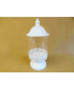 Skleněný svícen s kovovou pokličkou